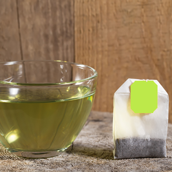 Tame puffy eyes with cold green tea bags