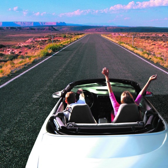 women driving in desert