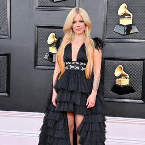 Avril Lavigne in a black dress at the Grammy Awards