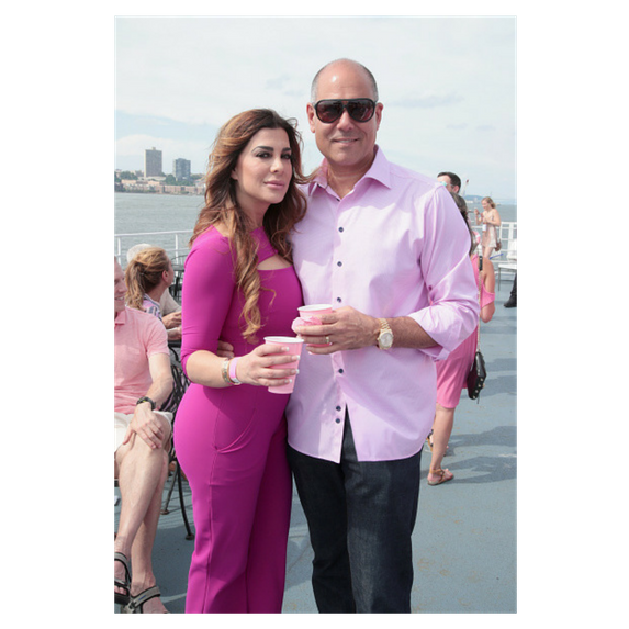 siggy and michael pose in matching pink outfits