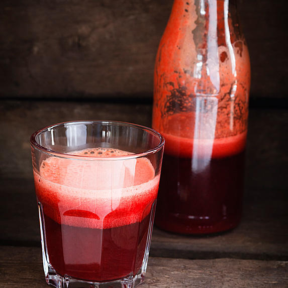 Bottle and glass of beet juice