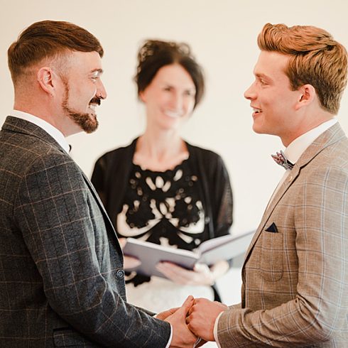 Officiant with two men