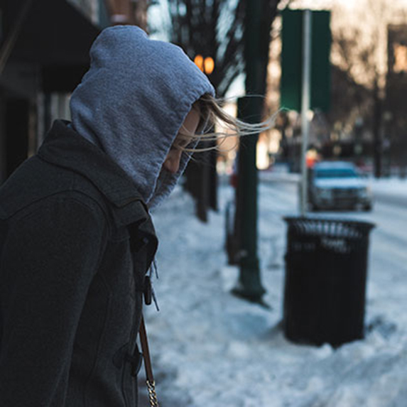 person walking in snowy weather