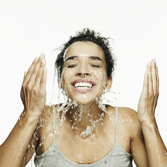 Splash your face with water instead of cleanser in the morning
