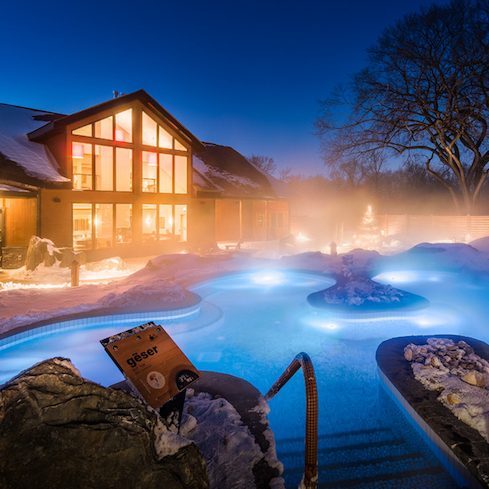Night views of the thermal outdoor pool facilities at Thermëa