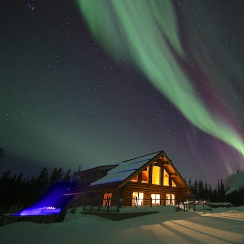 The Northern Lights overhead of the Yukon-based spa