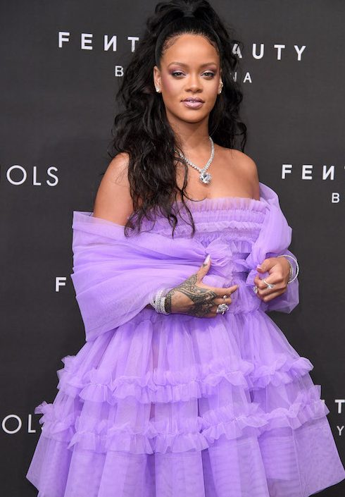 Rihanna wears a purple mini dress to the Fenty Beauty launch in 2017