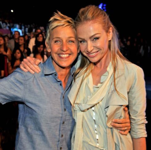 Ellen DeGeneres and Portia de Rossi holding each other