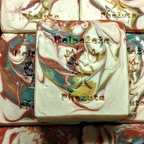 yellow turquoise red swirled soap bar