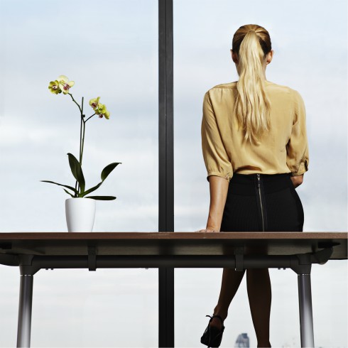 woman-sitting-alone-at-desk