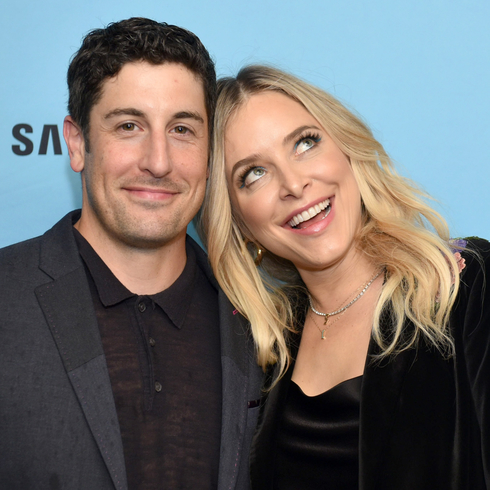 Jenny Mollen and Jason Biggs pose for a silly photo together at an event