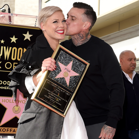 Carey Hart kissing wife Pink on the cheek at the Hollywood Walk of Fame