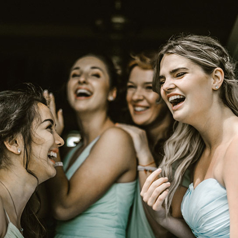 A group of women in wedding dresses