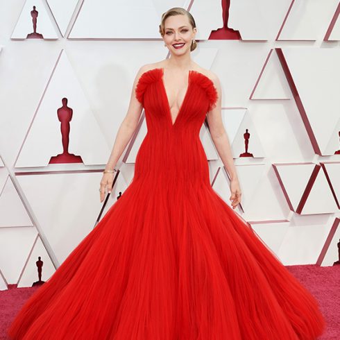 Amanda Seyfried in a bright red ruffled gown