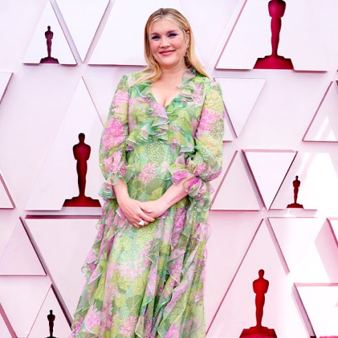 Emerald Fennell in a green and pink floral gown