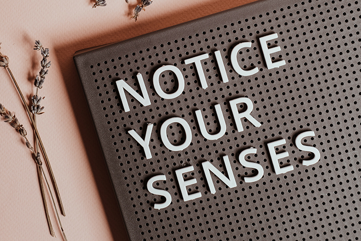 Sign with the words "Notice your senses"