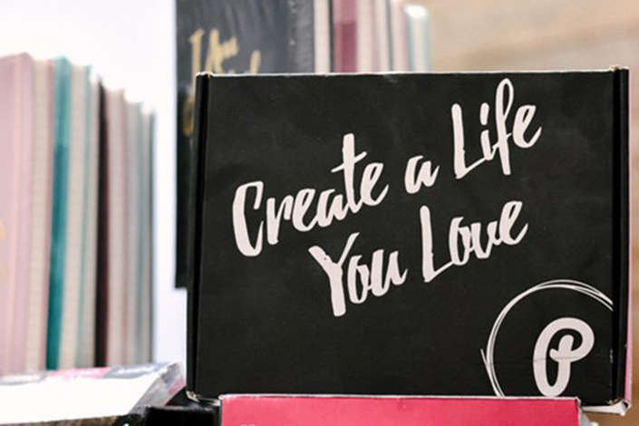 Sign with the words "create a life you love"