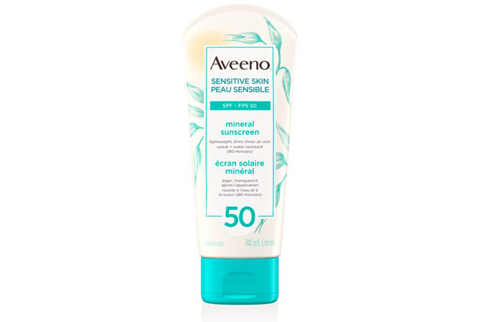 a white and baby blue bottle of sunscreen