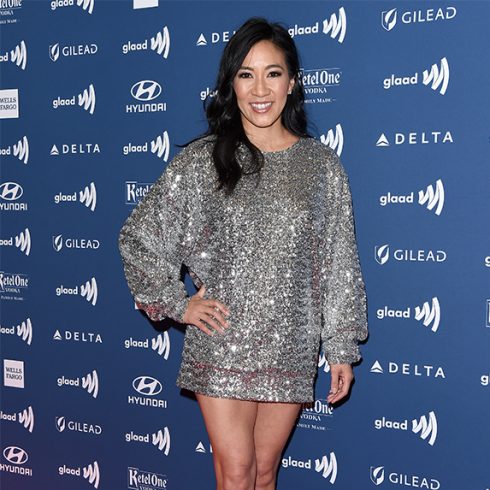 Michelle Kwan in a sparkly grey dress