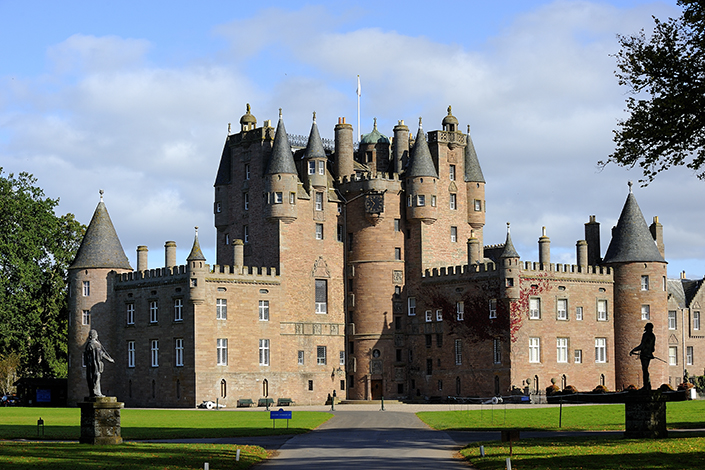 Glamis Castle in Angus Scotland. Glamis Castle was the childhood home of the Queen Mother, Elizabeth Bowes-Lyon.