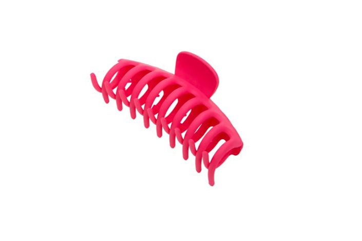 a pink claw clip against a white background