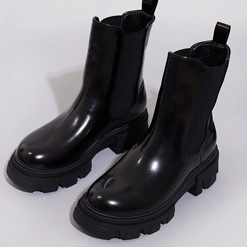 Pretty Little Thing black rubberized chelsea boots