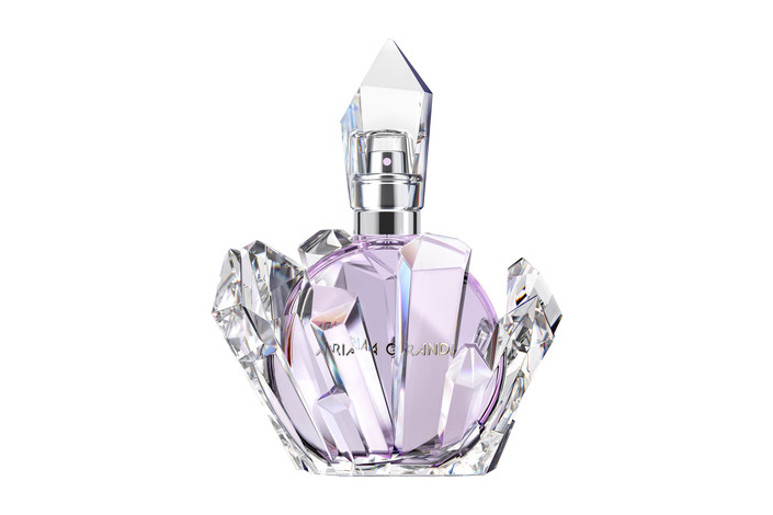 a clear bottle of perfume