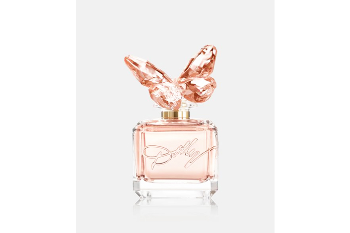 a small pink bottle of perfume