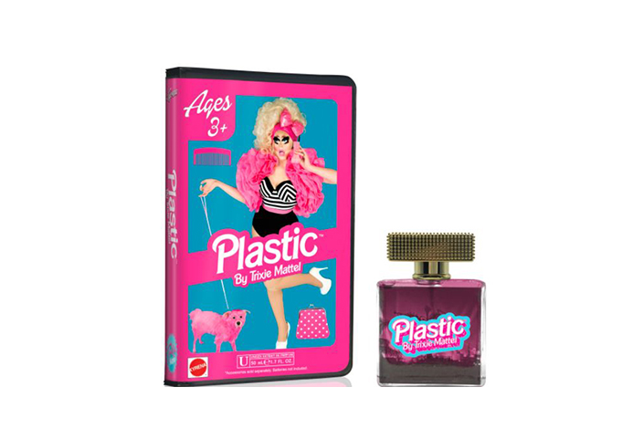 a bright pink, blue and purple bottle of perfume next to the box featuring drag queen Trixie Mattel