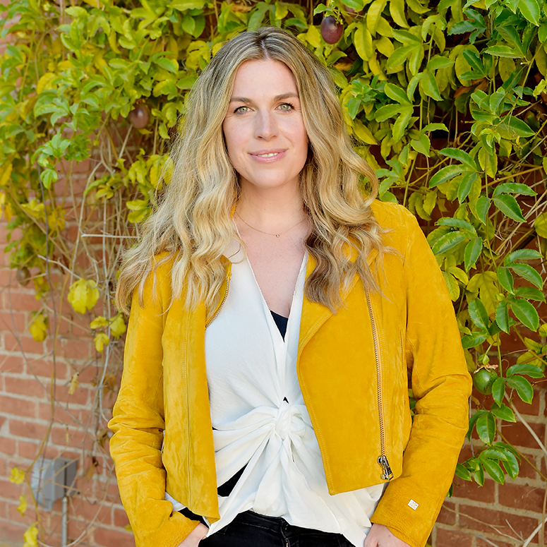 Joanna Griffiths in a yellow jacket