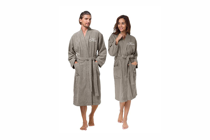 Couple in his and hers matching robes in gray