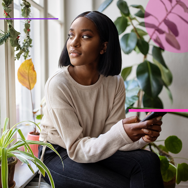 a young Black woman in her apartment, looking out the window and surrounded by indoor plants