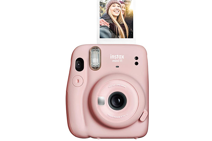 Pink Instax Mini with polaroid