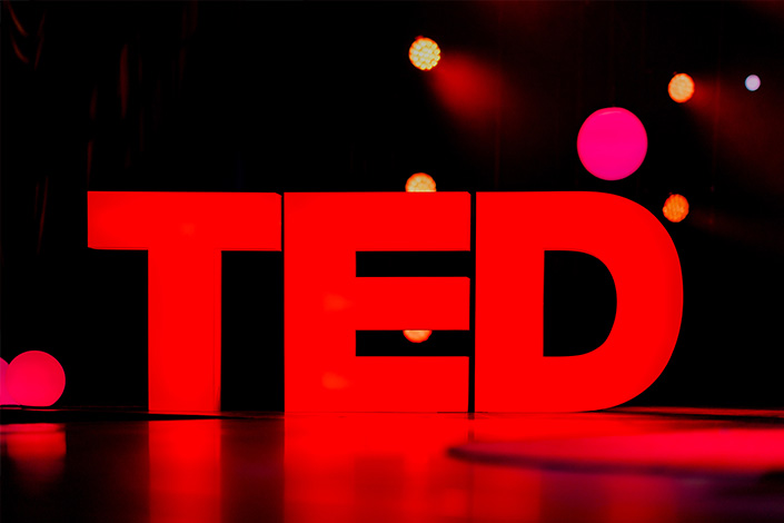 TED talk sign on stage