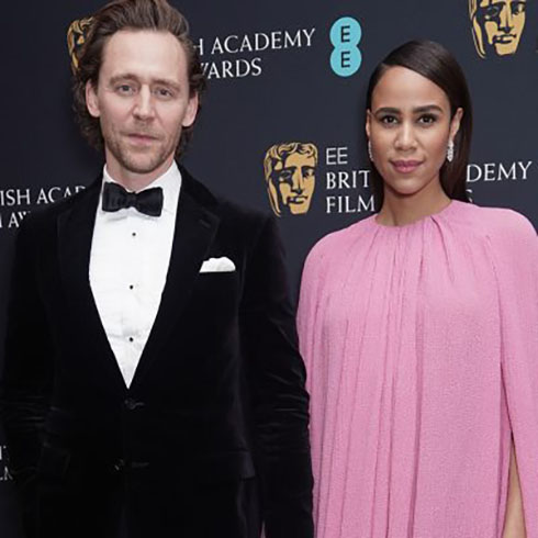 Tom Hiddleston and Zawe Ashton at a red carpet event.