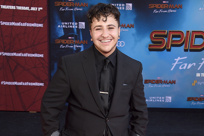 Zach Barack in a black suit on the red carpet