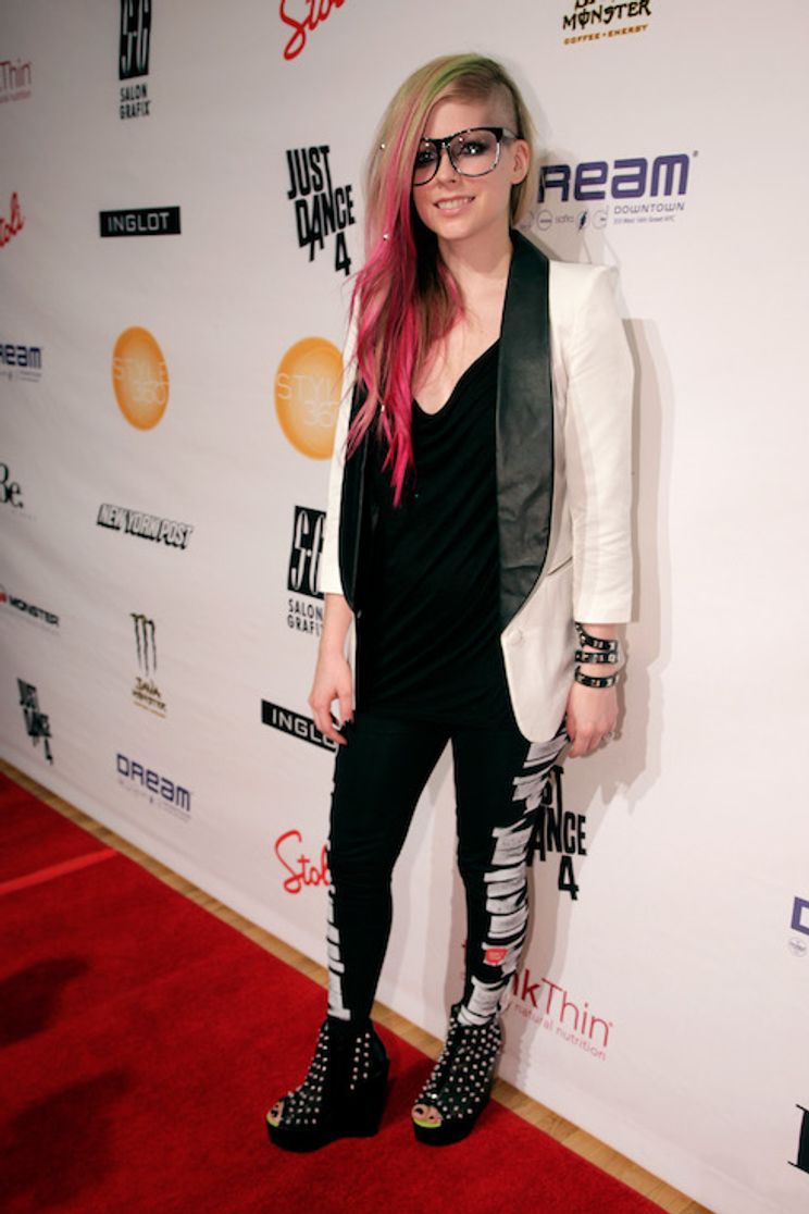 Avril Lavigne rocks glasses and a tuxedo-blazer for an Abbey Dawn show in 2012