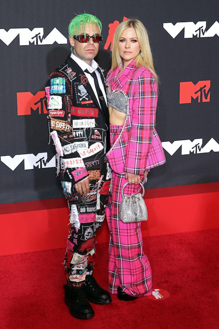 Avril Lavigne and boyfriend Mod Sun pose at the MTV Video Music Awards in 2021