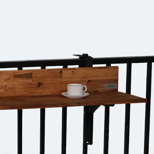 wood balcony bar with a white mug on top