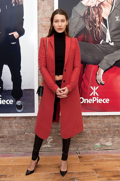 Bella Hadid in a red coat