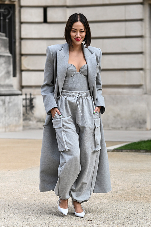 A woman in a grey outfit