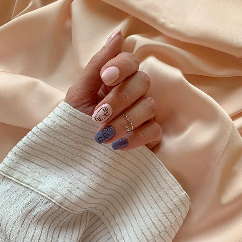 Woman with pink and purple nails