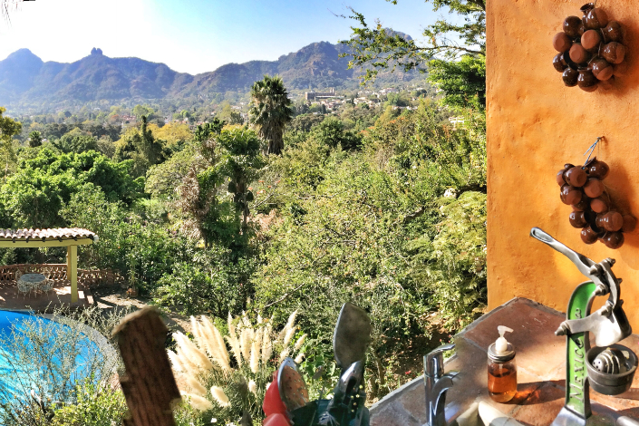 A view of mountains and trees from the open air kitchen at La Villa Bonita in Mexico