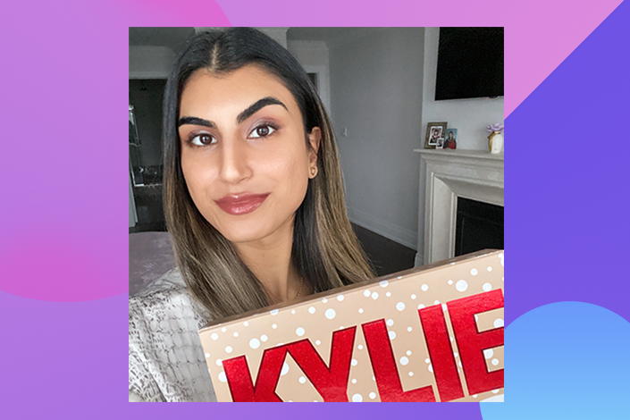 Mali Raja holding a Kylie Cosmetics Holiday Collection lip vault