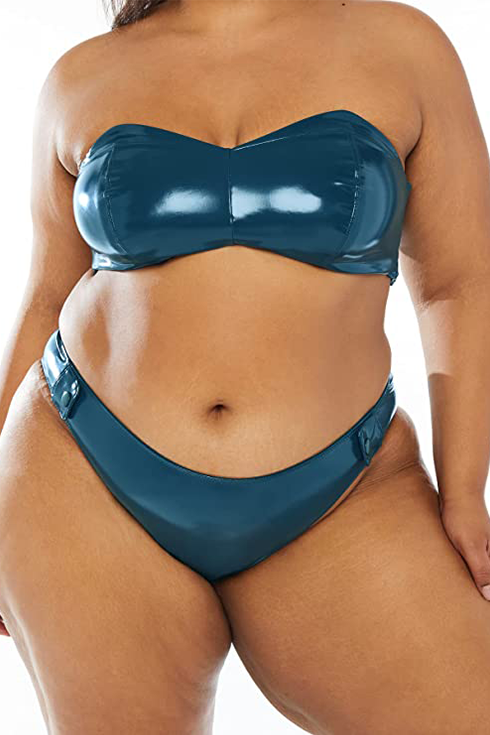 A woman in a blue vinyl bikini