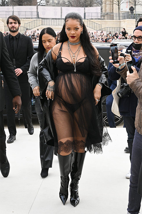 Rihanna in a black dress