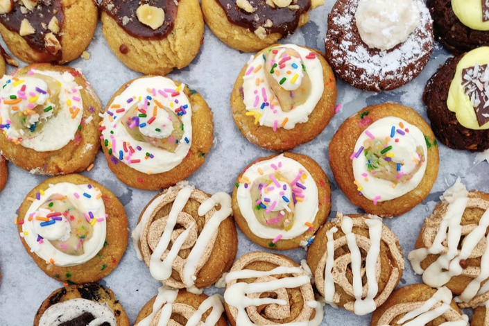 Assorted cookies with colourful toppings and sprinkles