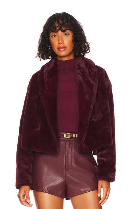 Model wearing a faux-fur coat