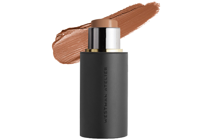 A product image of the Westman Atelier cream contour stick with a swatch in the background
