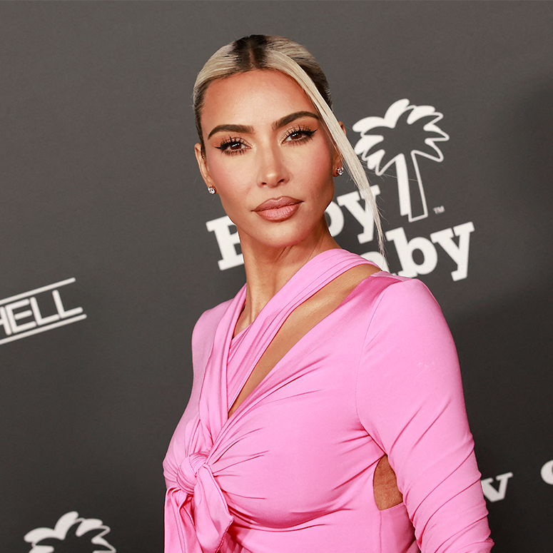 Kim Kardashian arrives for the 2022 Baby2Baby Gala wearing a pink dress